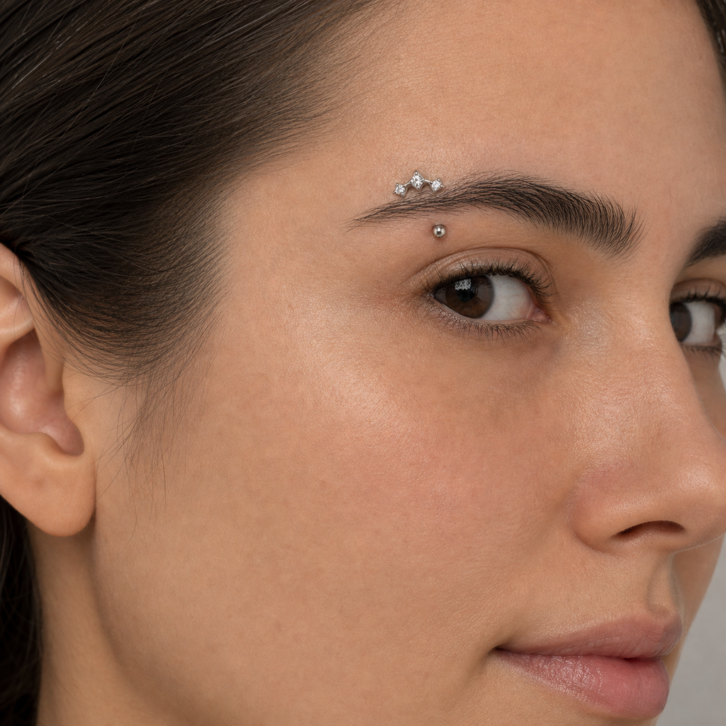Clear CZ ASTM F136 Titanium Eyebrow Ring - Silver, Threadless, 16G, 1.2 x 8+3 mm — wearing view one (P-EB-0011-S01)
