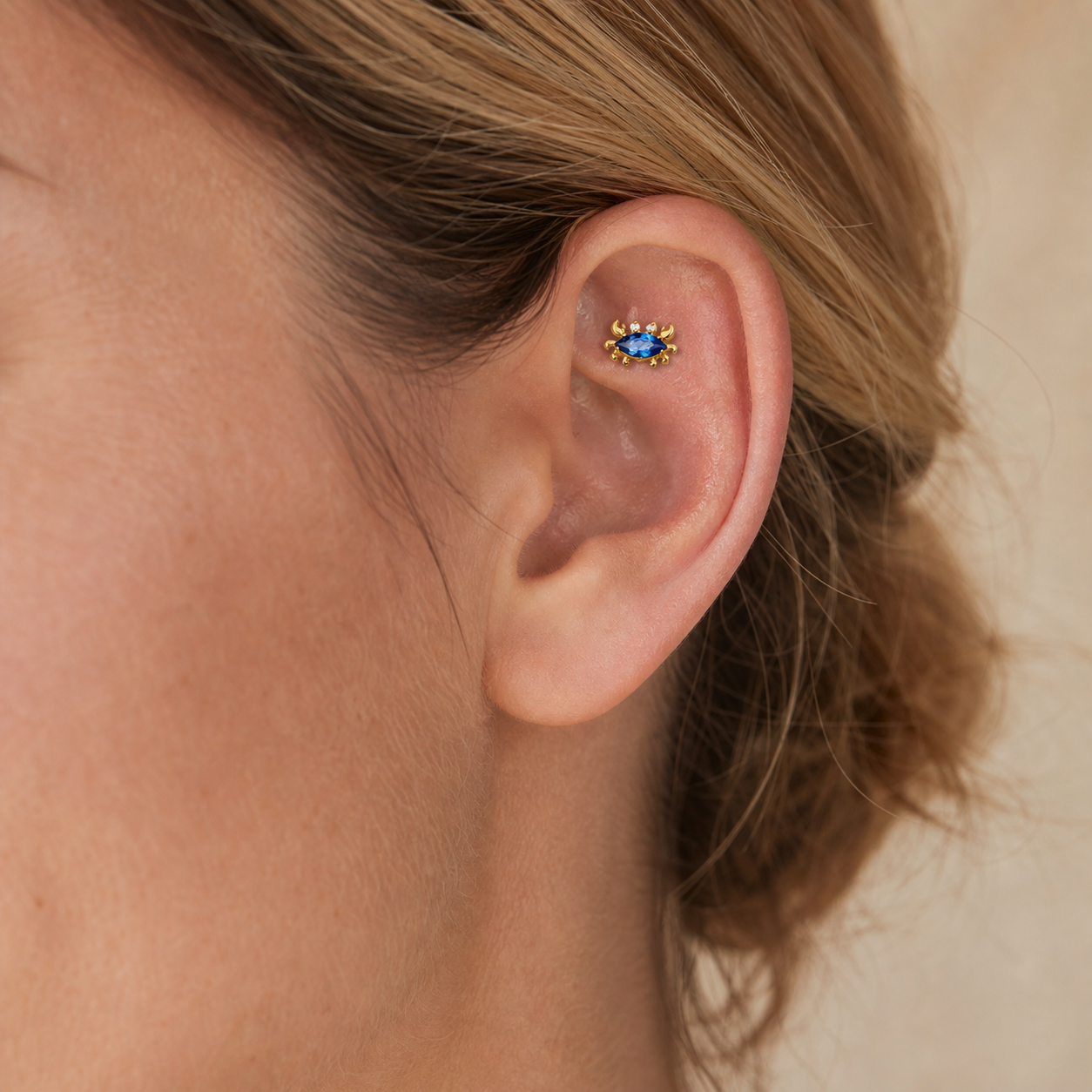 Navy Blue CZ ASTM F136 Titanium Flat Back - Gold, Internally Threaded, 18G, 1.0 x 6+4 mm — wearing view one (P-FB-0051-G01)