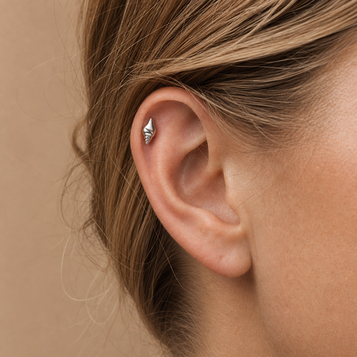 ASTM F136 Titanium Flat Back - Silver, Internally Threaded, 18G, 1.0 x 6+4 mm — wearing view one (P-FB-0054-S01)