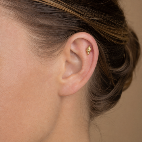 ASTM F136 Titanium Flat Back - Gold, Internally Threaded, 18G, 1.0 x 6+4 mm — wearing view one (P-FB-0055-G01)