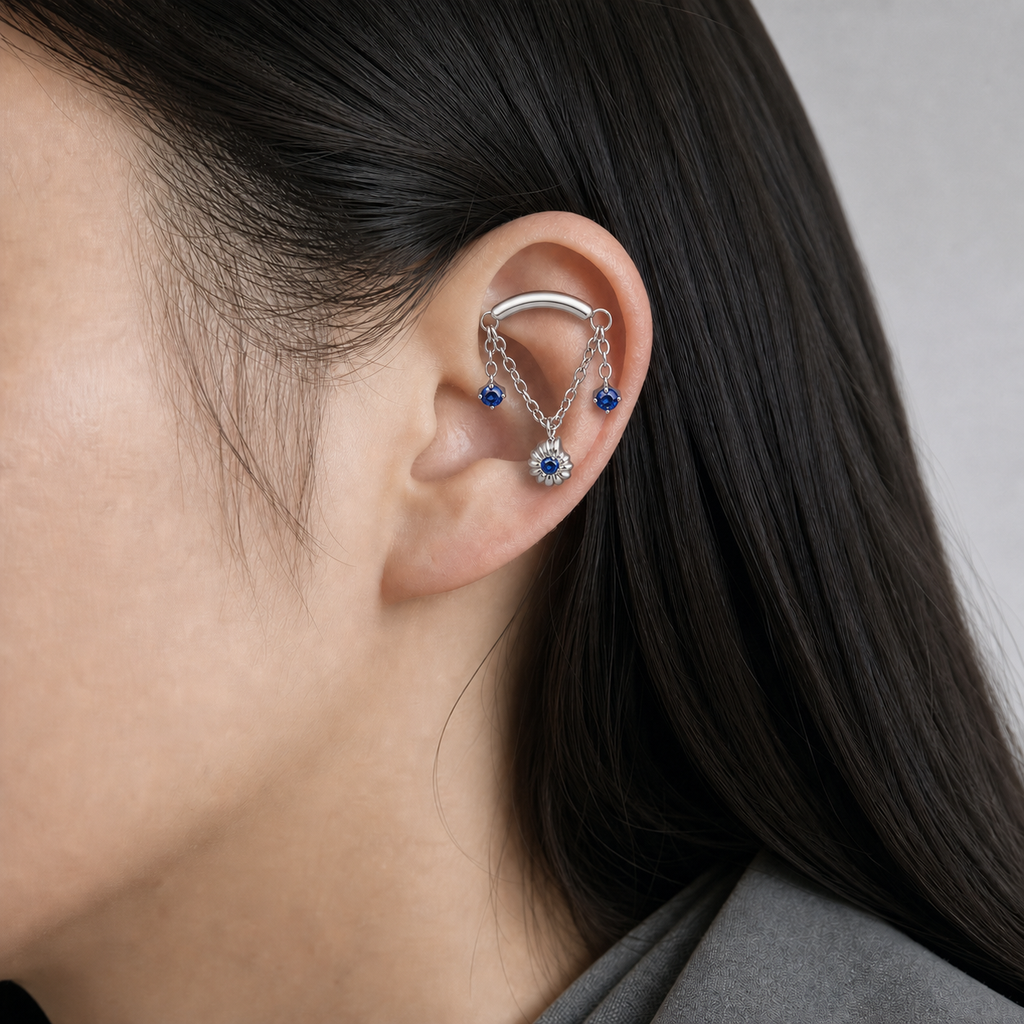 Navy Blue CZ ASTM F136 Titanium Flat Back - Silver, Internally Threaded, 18G, 1.0 x 6+4 mm — wearing view three (P-FB-0056-S01)
