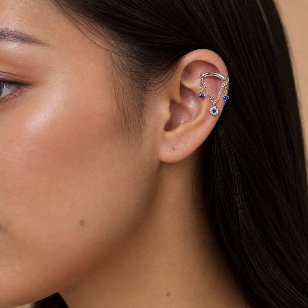 Navy Blue CZ ASTM F136 Titanium Flat Back - Silver, Internally Threaded, 18G, 1.0 x 6+4 mm — wearing view six (P-FB-0056-S01)