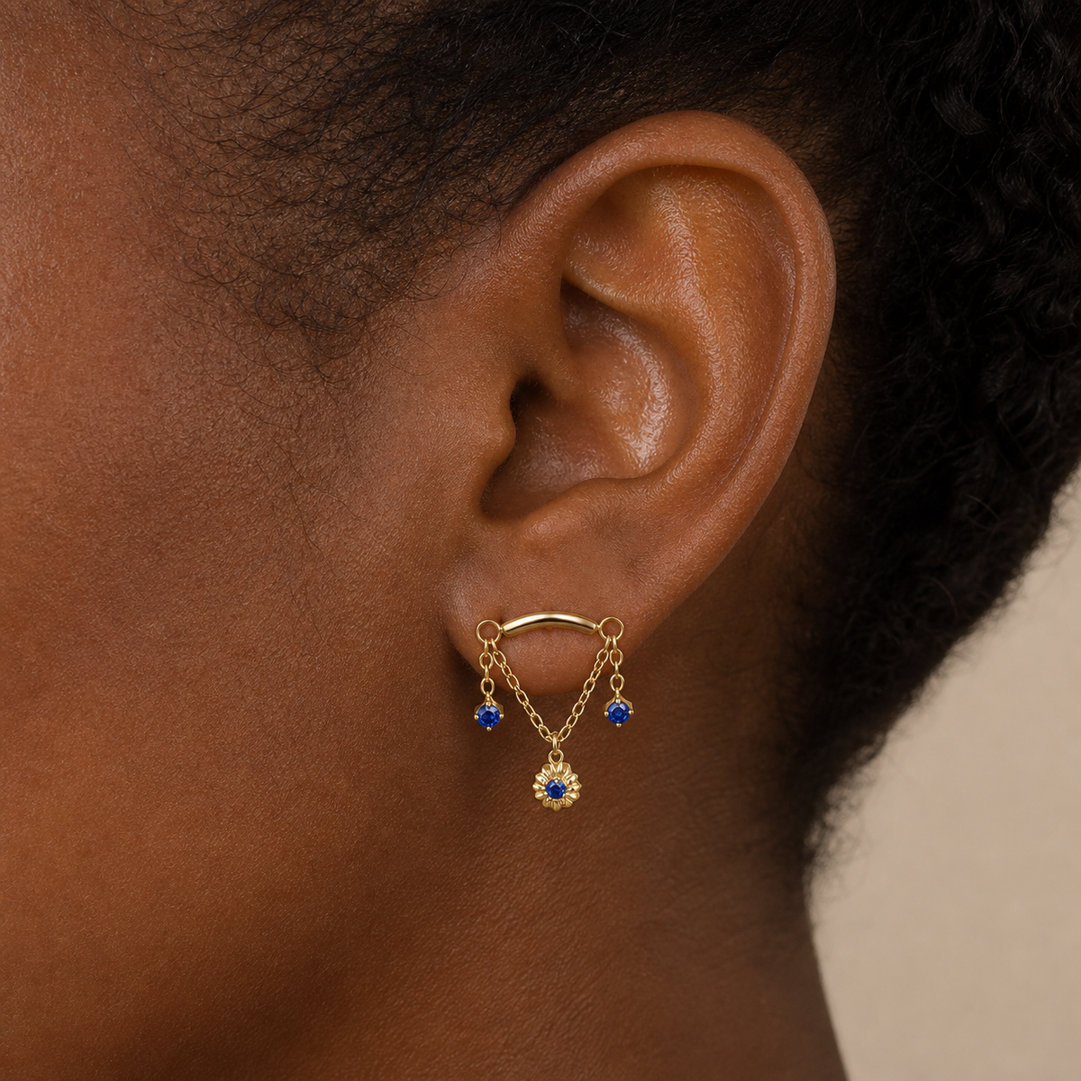 Navy Blue CZ ASTM F136 Titanium Flat Back - Gold, Internally Threaded, 18G, 1.0 x 6+4 mm — wearing view three (P-FB-0057-G01)