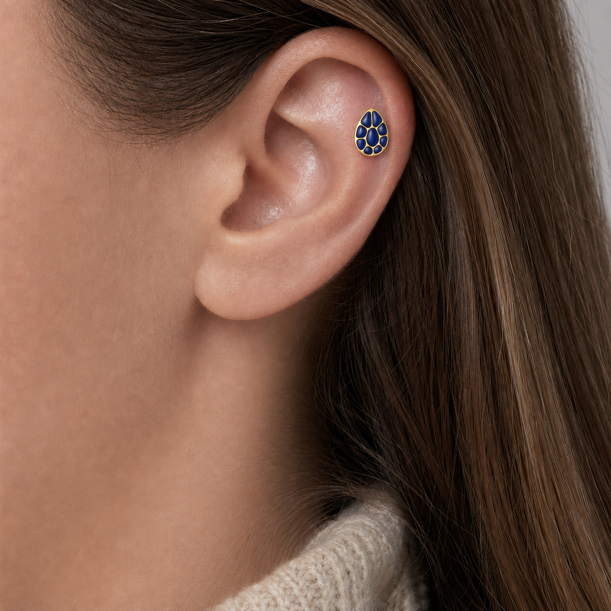 ASTM F136 Titanium Flat Back - Gold, Threadless, 16G, 1.2 x 6+4 mm — wearing view one (P-FB-0061-G01)