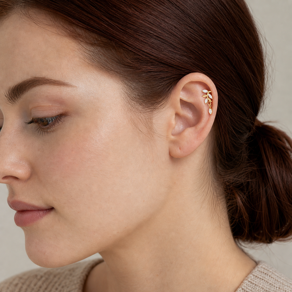 Clear CZ ASTM F136 Titanium Flat Back - Gold, Threadless, 18G, 1.0 x 6+4 mm — wearing view one (P-FB-0069-G01)