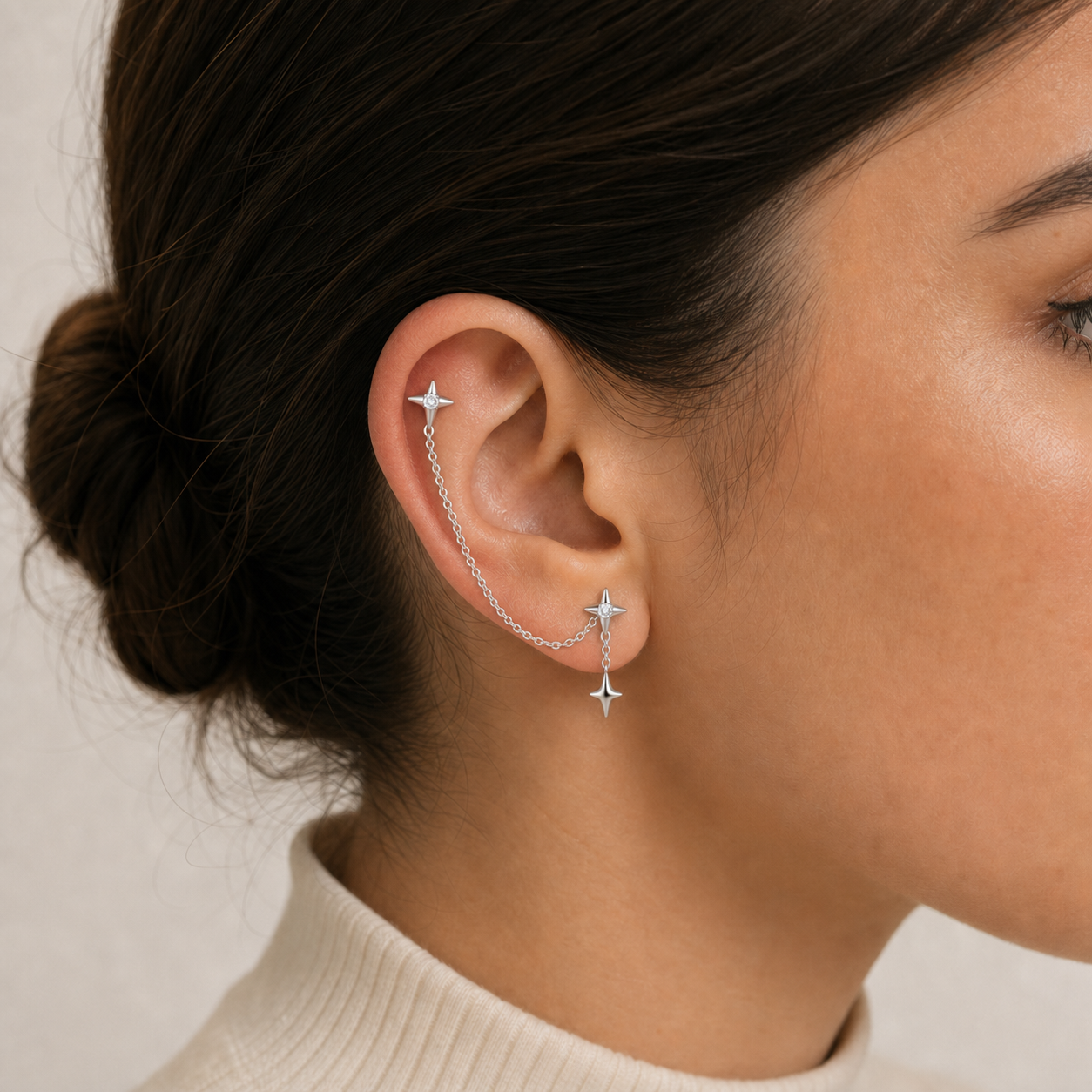 Clear CZ ASTM F136 Titanium Flat Back - Silver, Threadless, 18G, 1.0 x 6+4 mm — wearing view one (P-FB-0074-S01)