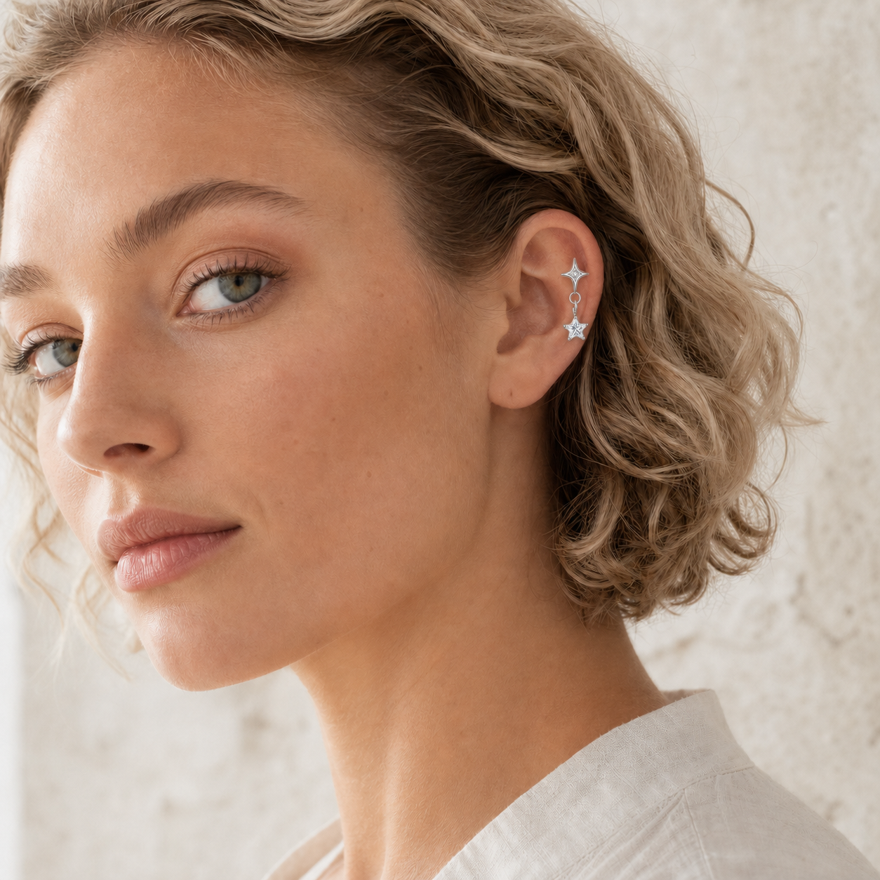 Clear CZ ASTM F136 Titanium Flat Back - Silver, Threadless, 16G, 1.2 x 6+4 mm — wearing view one (P-FB-0095-S01)