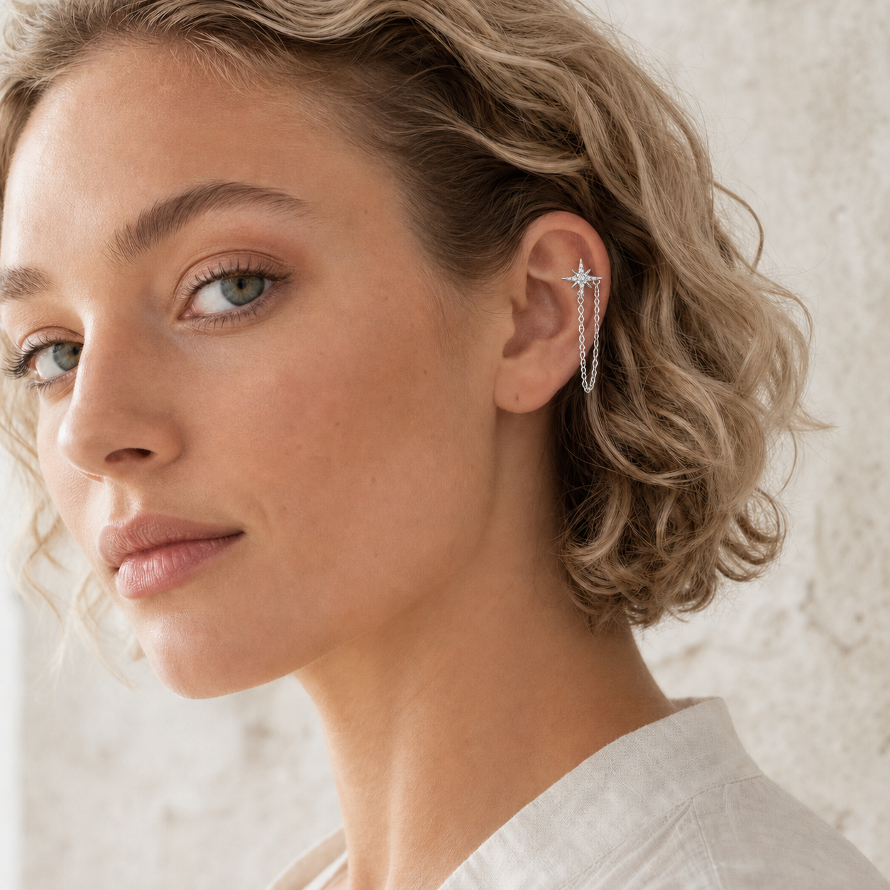 Clear CZ ASTM F136 Titanium Flat Back - Silver, Internally Threaded, 18G, 1.0 x 6+4 mm — wearing view one (P-FB-0097-S01)