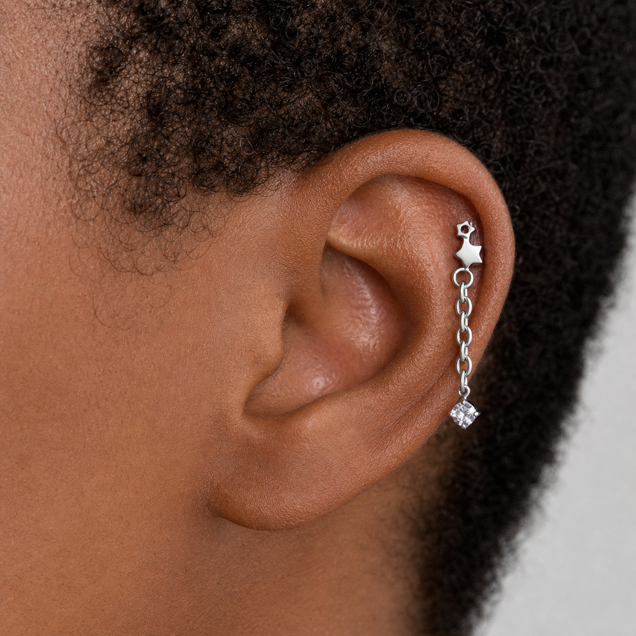 Clear CZ ASTM F136 Titanium Flat Back - Silver, Threadless, 16G, 1.2 x 6+4 mm — wearing view five (P-FB-0100-S01)