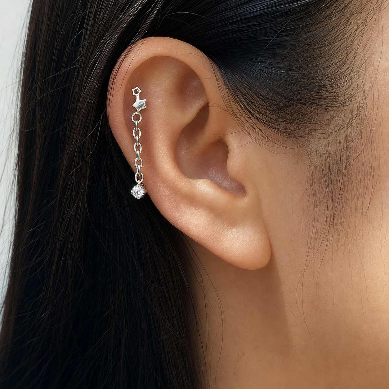 Clear CZ ASTM F136 Titanium Flat Back - Silver, Threadless, 16G, 1.2 x 6+4 mm — wearing view six (P-FB-0100-S01)