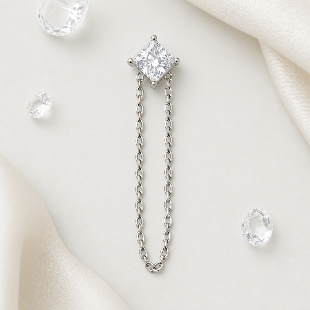 Clear CZ ASTM F136 Titanium Flat Back - Silver, Threadless, 18G, 1.0 x 6+4 mm — styled flat lay (P-FB-0101-S01)