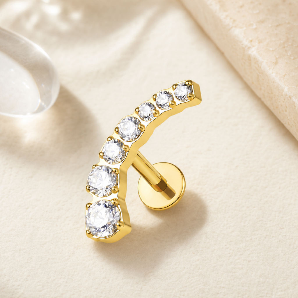 Clear CZ ASTM F136 Titanium Flat Back - Gold, Threadless, 16G, 1.2 x 6+4 mm — styled flat lay (P-FB-0104-G01)