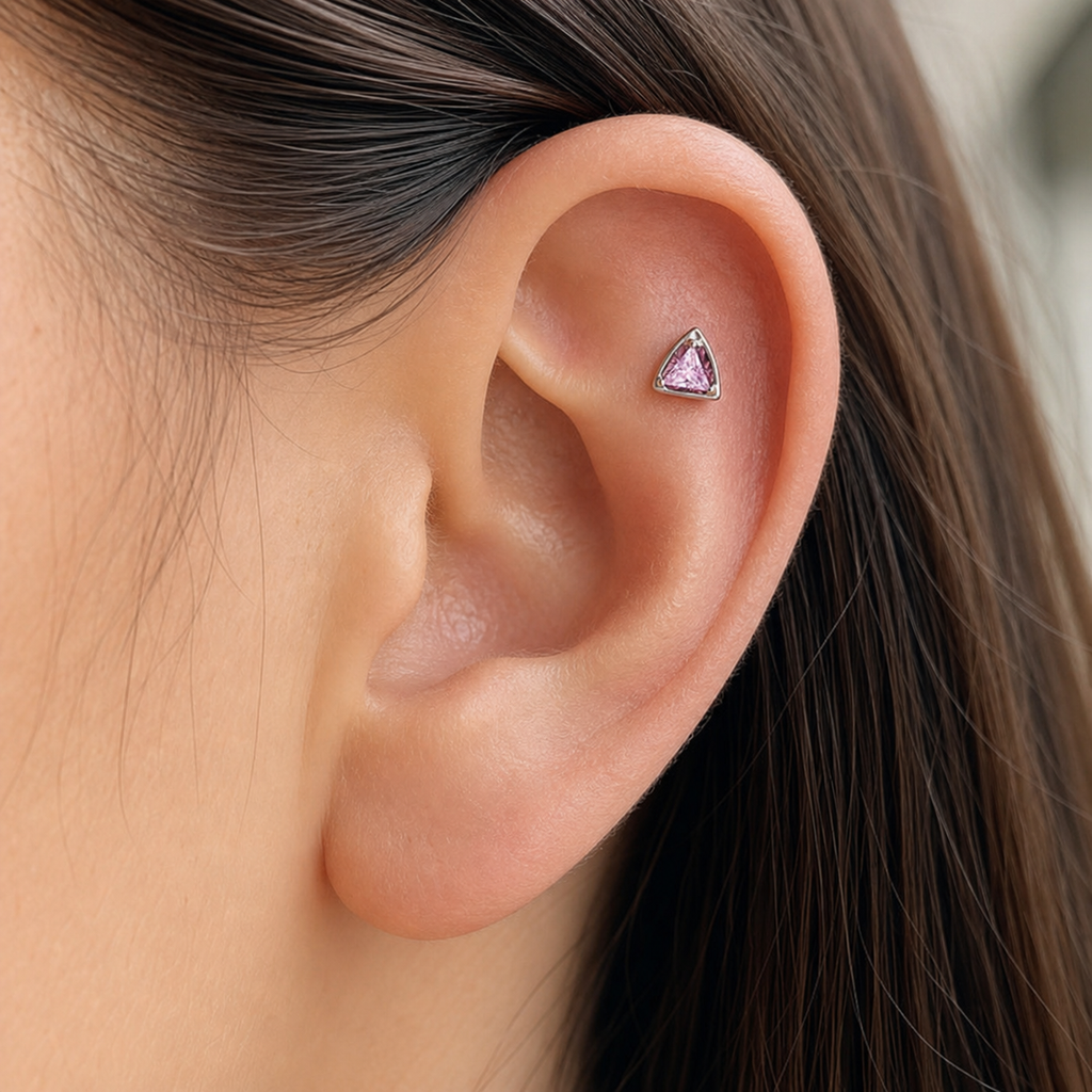 Pink CZ ASTM F136 Titanium Flat Back - Silver, Threadless, 16G, 1.2 x 8+4 mm — wearing view one (P-FB-0106-S01)