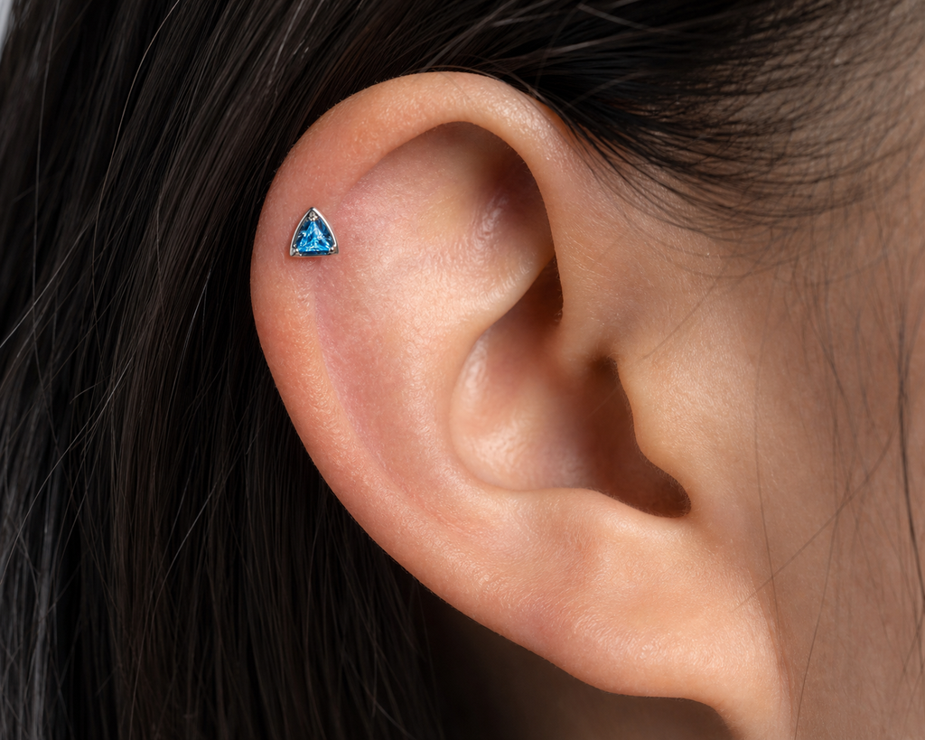 Blue CZ ASTM F136 Titanium Flat Back - Silver, Threadless, 16G, 1.2 x 8+4 mm — wearing view three (P-FB-0108-S01)