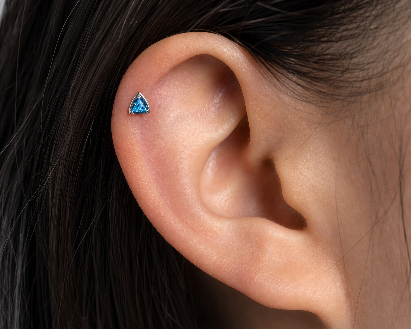 Blue CZ ASTM F136 Titanium Flat Back - Silver, Threadless, 16G, 1.2 x 8+4 mm — wearing view three (P-FB-0108-S01)