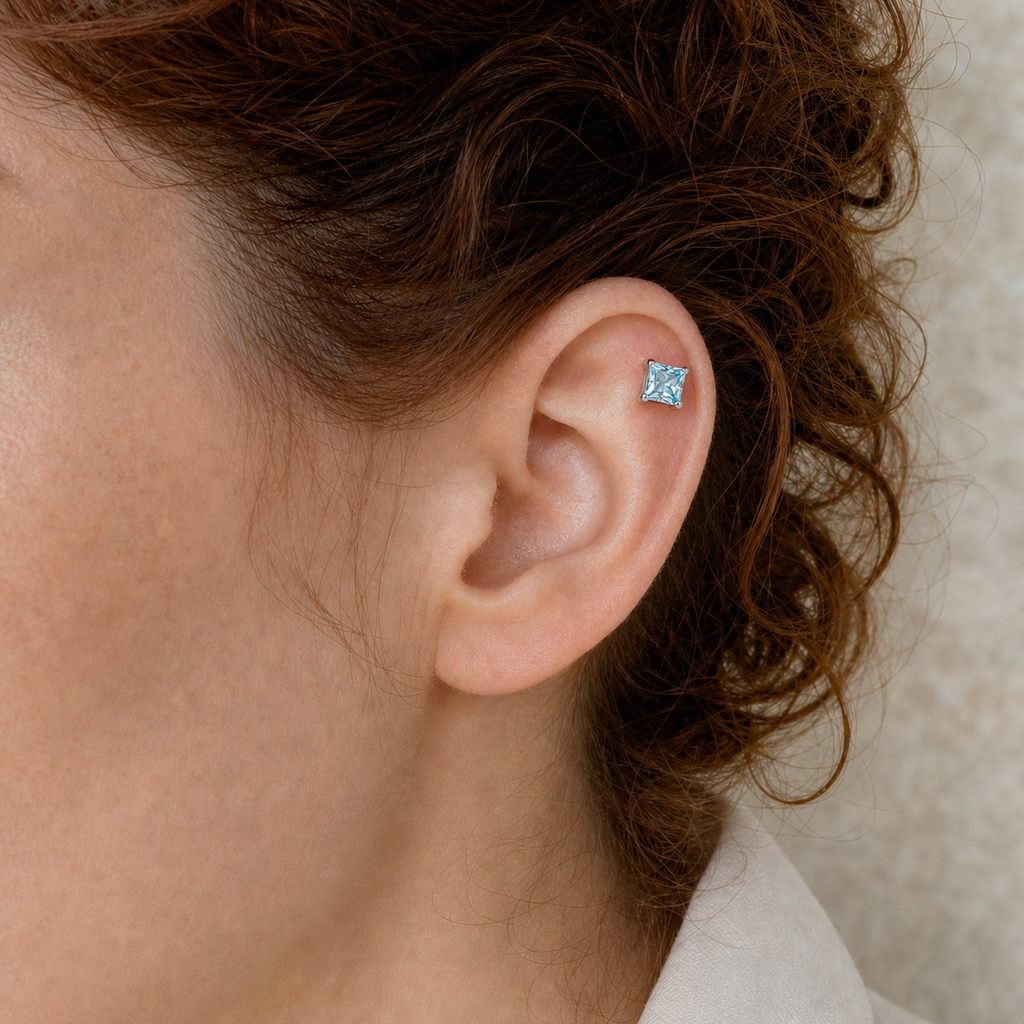 Light Blue ASTM F136 Titanium Flat Back - Silver, Threadless, 20G, 0.8 x 6+2.5+3 mm — wearing view one (P-FB-0111-S01)