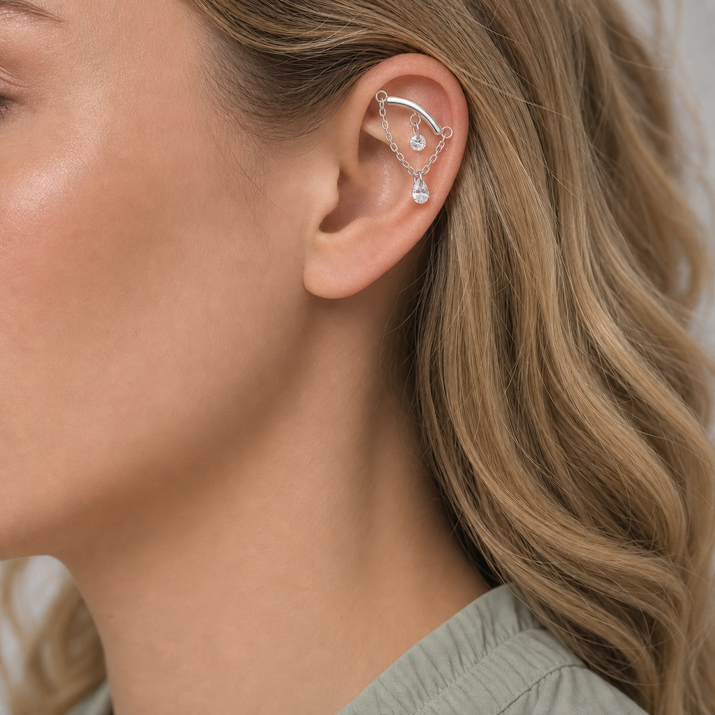 Clear CZ ASTM F136 Titanium Flat Back - Silver, Internally Threaded, 16G, 1.2 x 6+8+4 mm — wearing view one (P-FB-0119-S01)