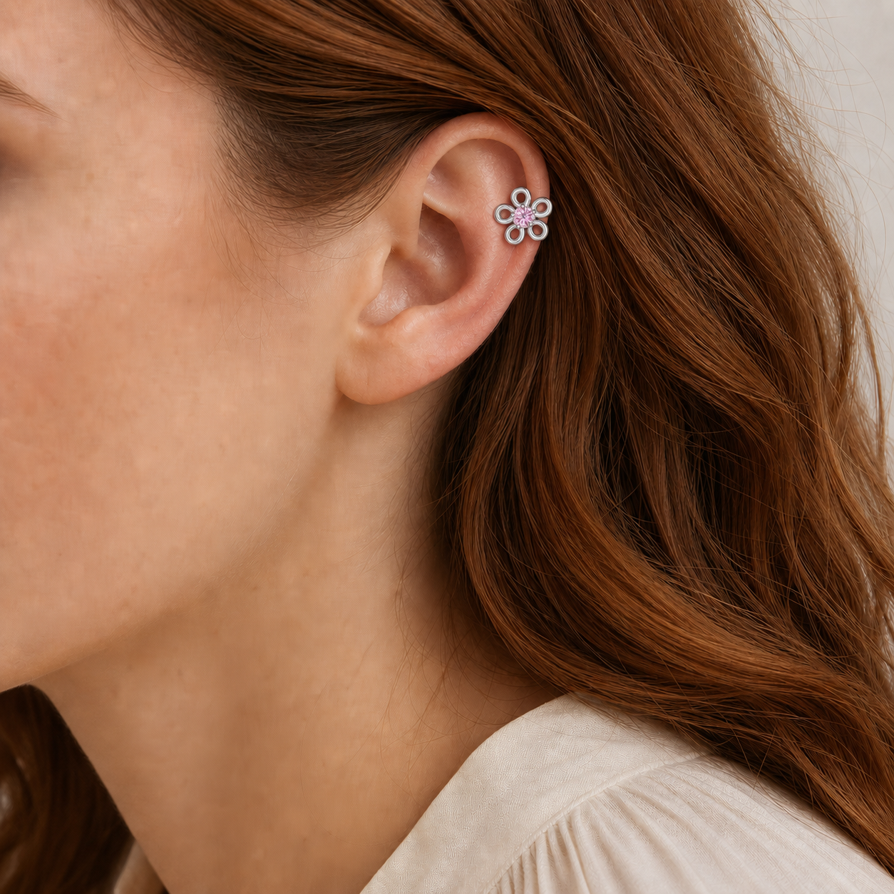 Pink CZ ASTM F136 Titanium Flat Back - Silver, Threadless, 16G, 1.2 x 6+4 mm — wearing view one (P-FB-0133-S01)