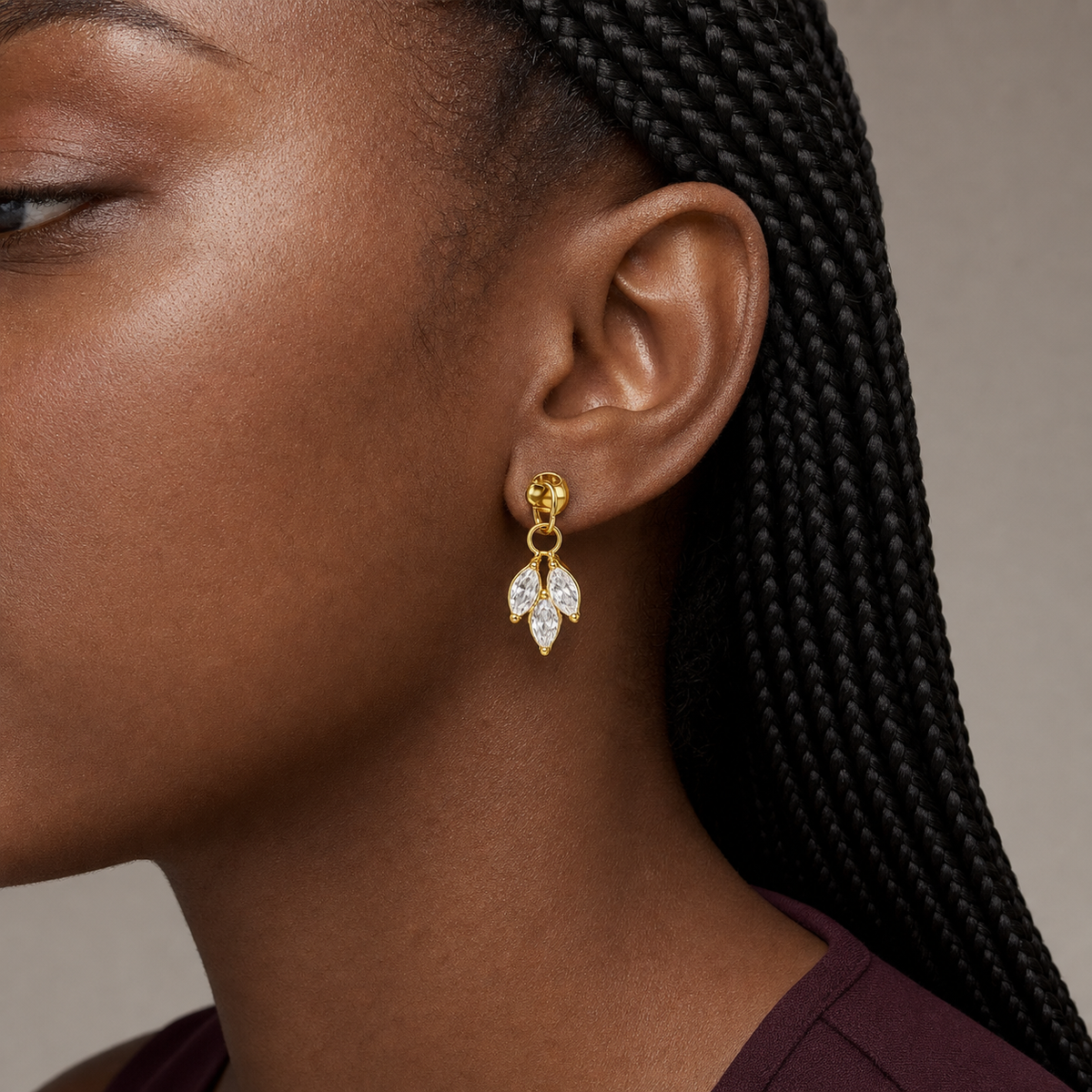 Clear CZ ASTM F136 Titanium Flat Back - Gold, Internally Threaded, 16G, 1.2 x 6 mm — wearing view on deep skin (P-FB-0141-G01)