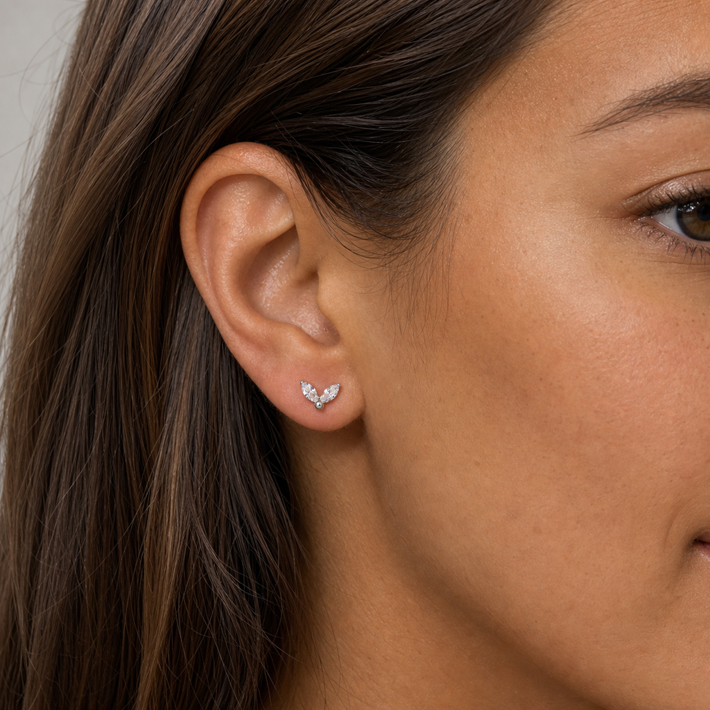 Clear CZ ASTM F136 Titanium Flat Back - Silver, Threadless, 16G, 1.2 x 8+4 mm — wearing view one (P-FB-0146-S01)