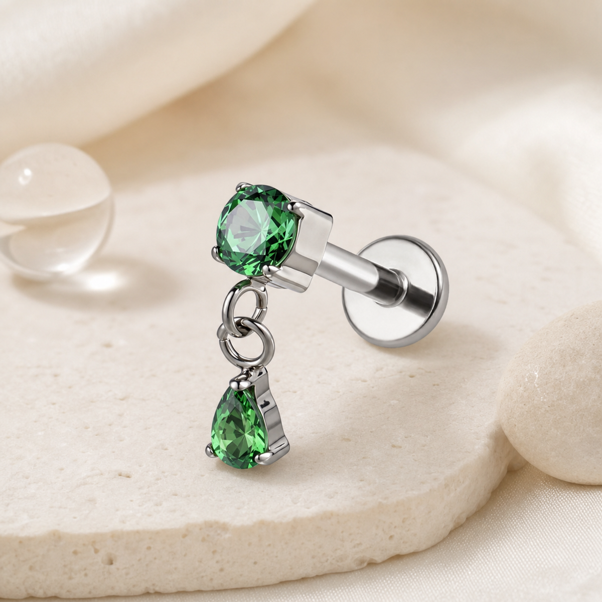Green ASTM F136 Titanium Flat Back - Silver, Internally Threaded, 16G, 1.2 x 6 mm — styled flat lay (P-FB-0152-S01)