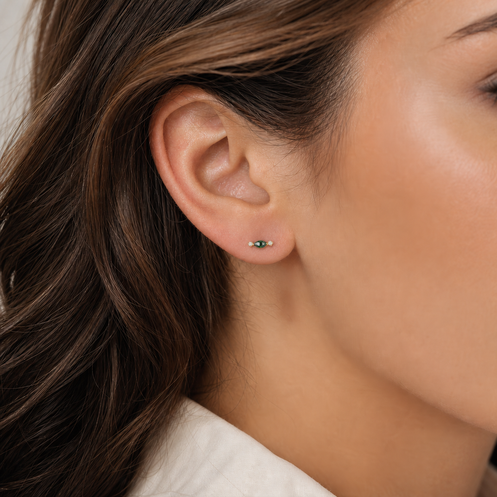 Emerald ASTM F136 Titanium Flat Back - Gold, Internally Threaded, 16G, 1.2 x 8+4 mm — wearing view one (P-FB-0156-G01)