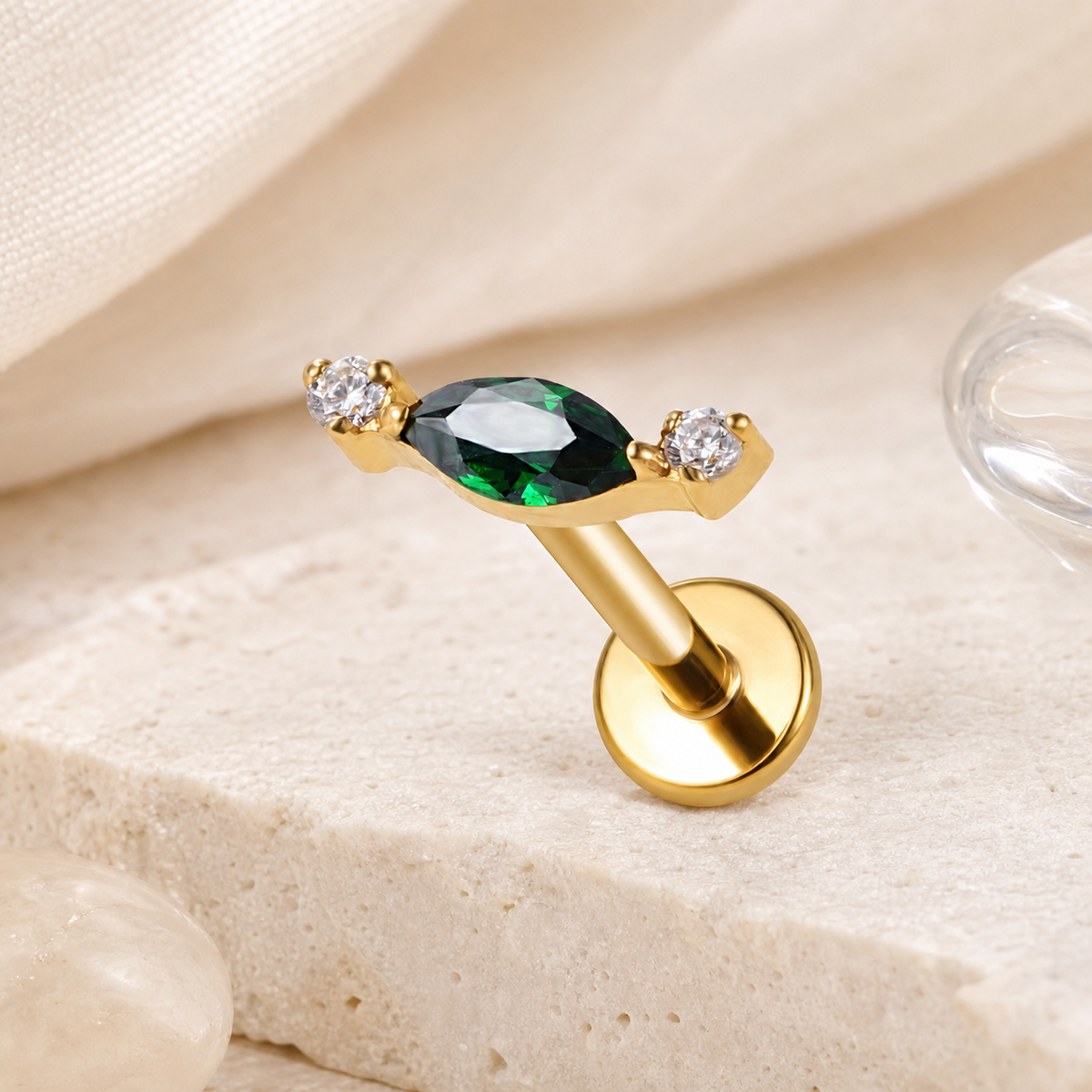 Emerald ASTM F136 Titanium Flat Back - Gold, Internally Threaded, 16G, 1.2 x 8+4 mm — styled flat lay (P-FB-0156-G01)