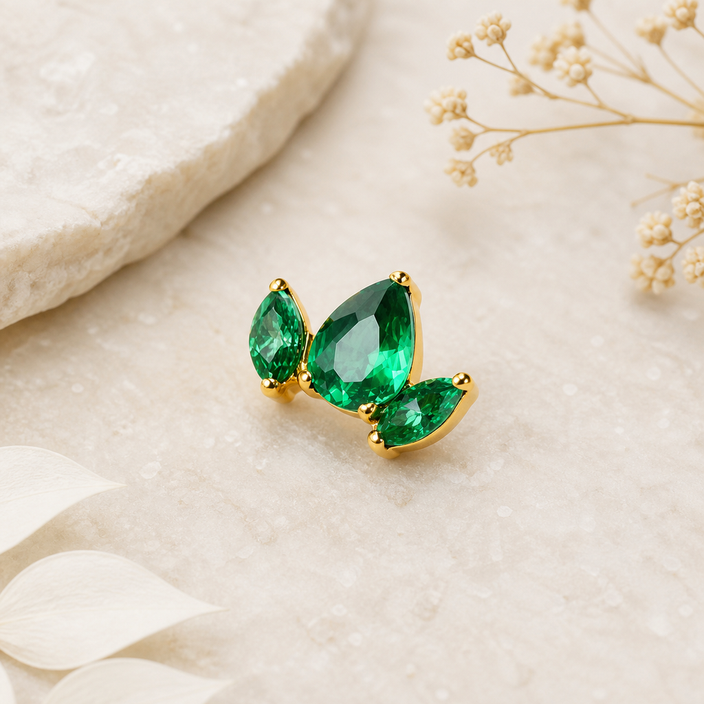 Green CZ ASTM F136 Titanium Flat Back - Gold, Threadless, 16G, 1.2 x 6+4 mm — styled flat lay (P-FB-0178-G01)