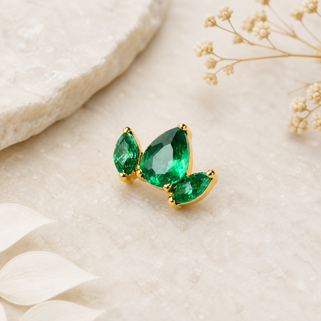Green CZ ASTM F136 Titanium Flat Back - Gold, Threadless, 16G, 1.2 x 6+4 mm — styled flat lay (P-FB-0178-G01)