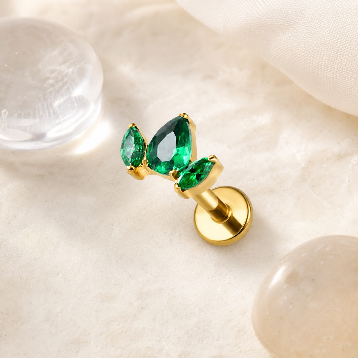 Green CZ ASTM F136 Titanium Flat Back - Gold, Threadless, 16G, 1.2 x 6+4 mm — styled flat lay (P-FB-0178-G01)