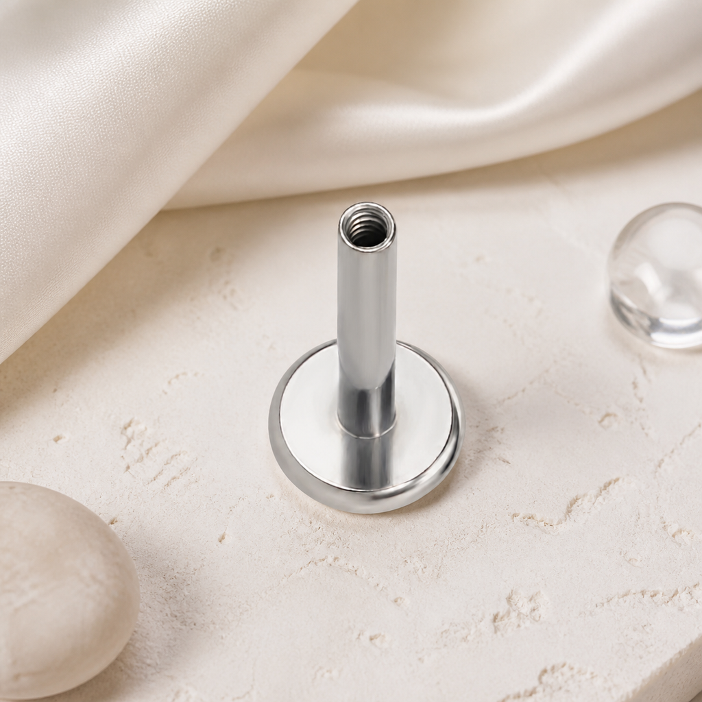 ASTM F136 Titanium Piercing Part - Silver, Internally Threaded, 16G, 1.2 x 7+4 mm — styled flat lay (P-PT-0020-S01)
