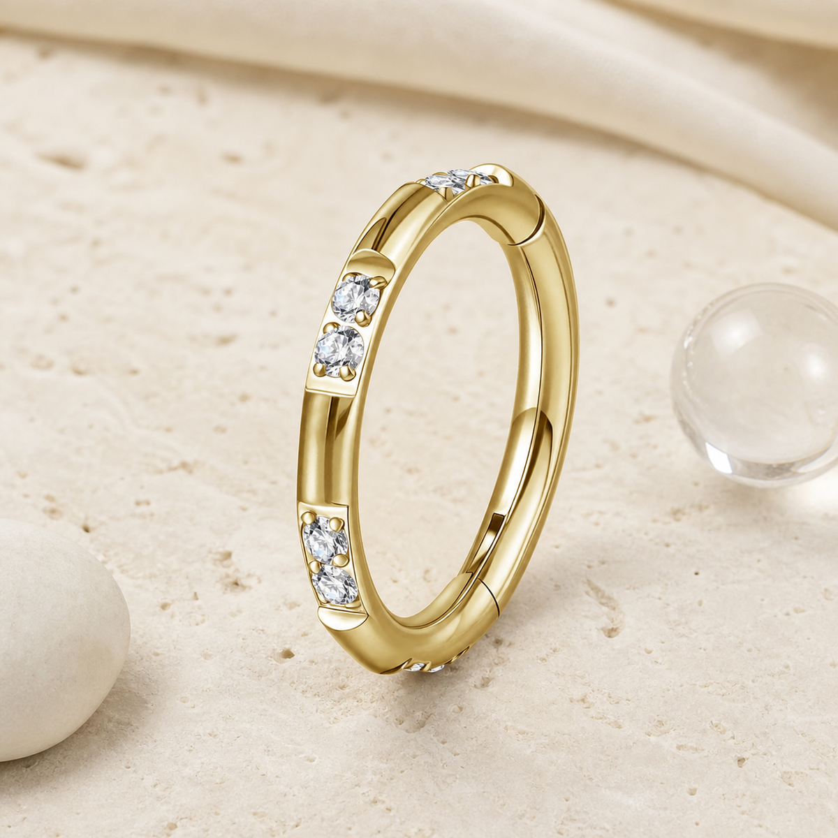 Clear CZ ASTM F136 Titanium Segment Ring - Gold, 16G, 1.2 x 8 mm — styled flat lay (P-SR-0044-G01)
