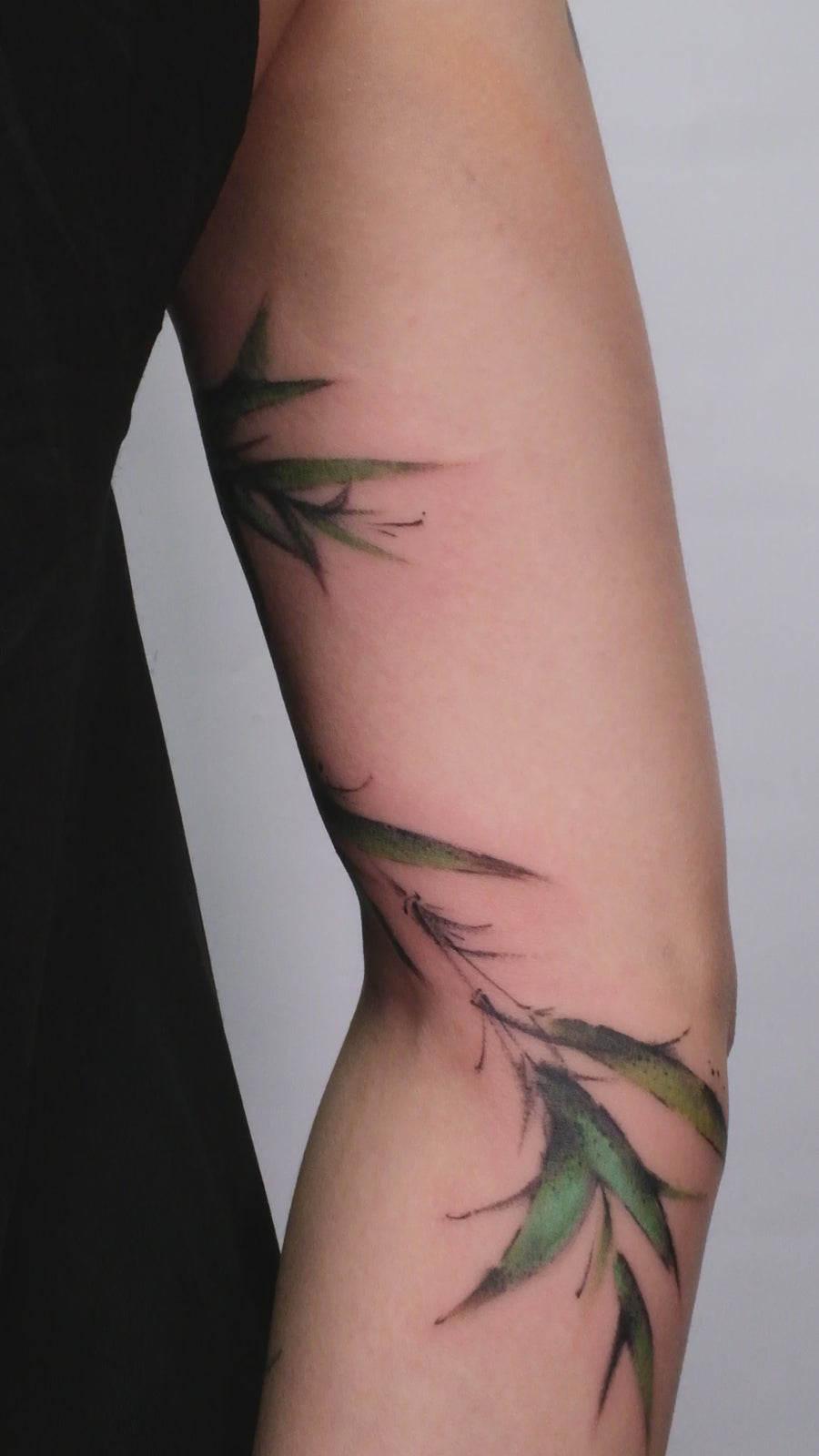 Ink brush bamboo forearm tattoo by Zero