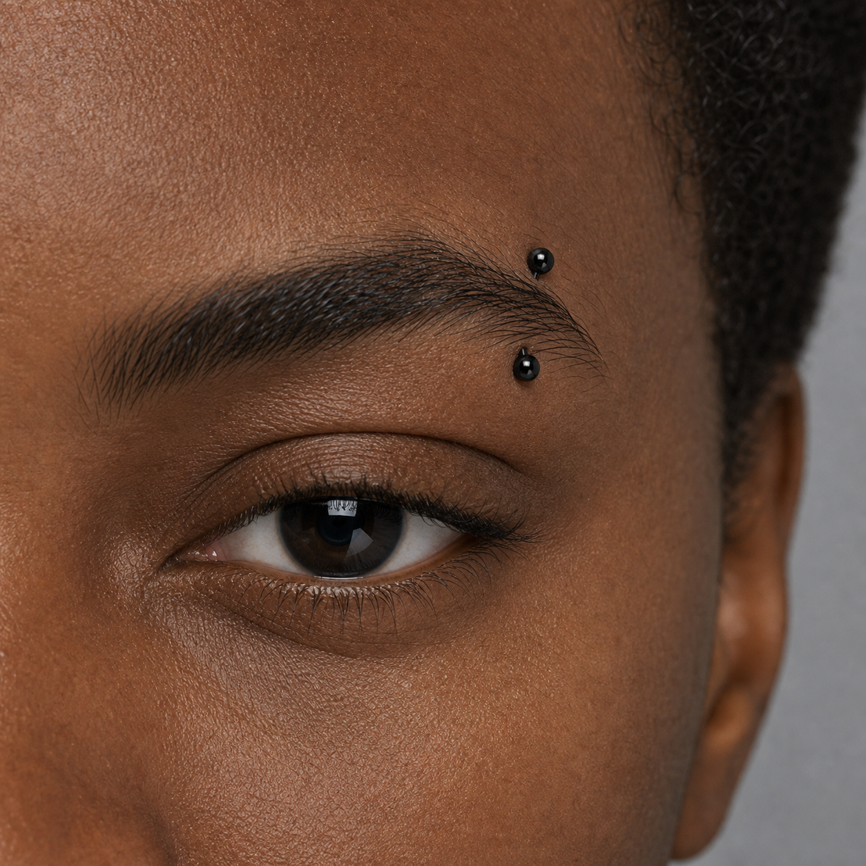 Implant Grade Titanium - Eyebrow Ring - Black - 16G (1.2 x 10+3+3 mm) - model wear view