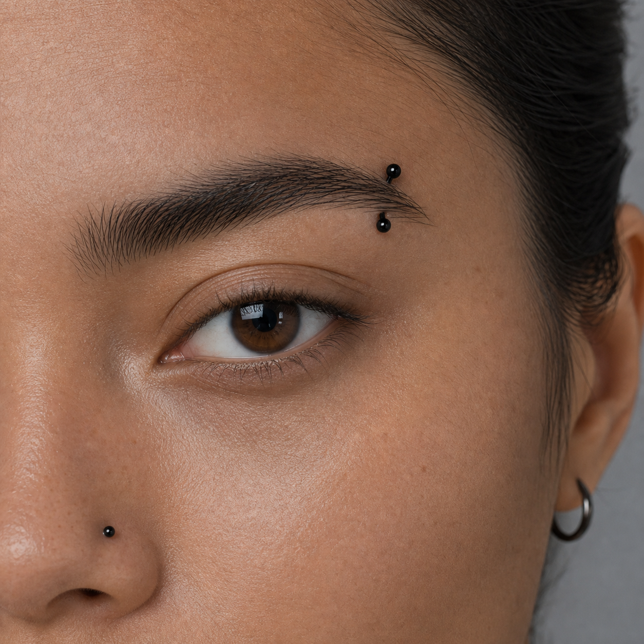 Implant Grade Titanium - Eyebrow Ring - Black - 16G (1.2 x 10+3+3 mm) - model wear view