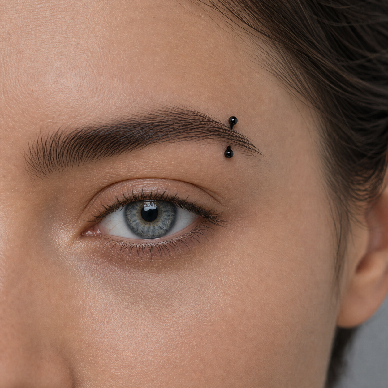 Implant Grade Titanium - Eyebrow Ring - Black - 16G (1.2 x 6+3+3 mm) - model wear view