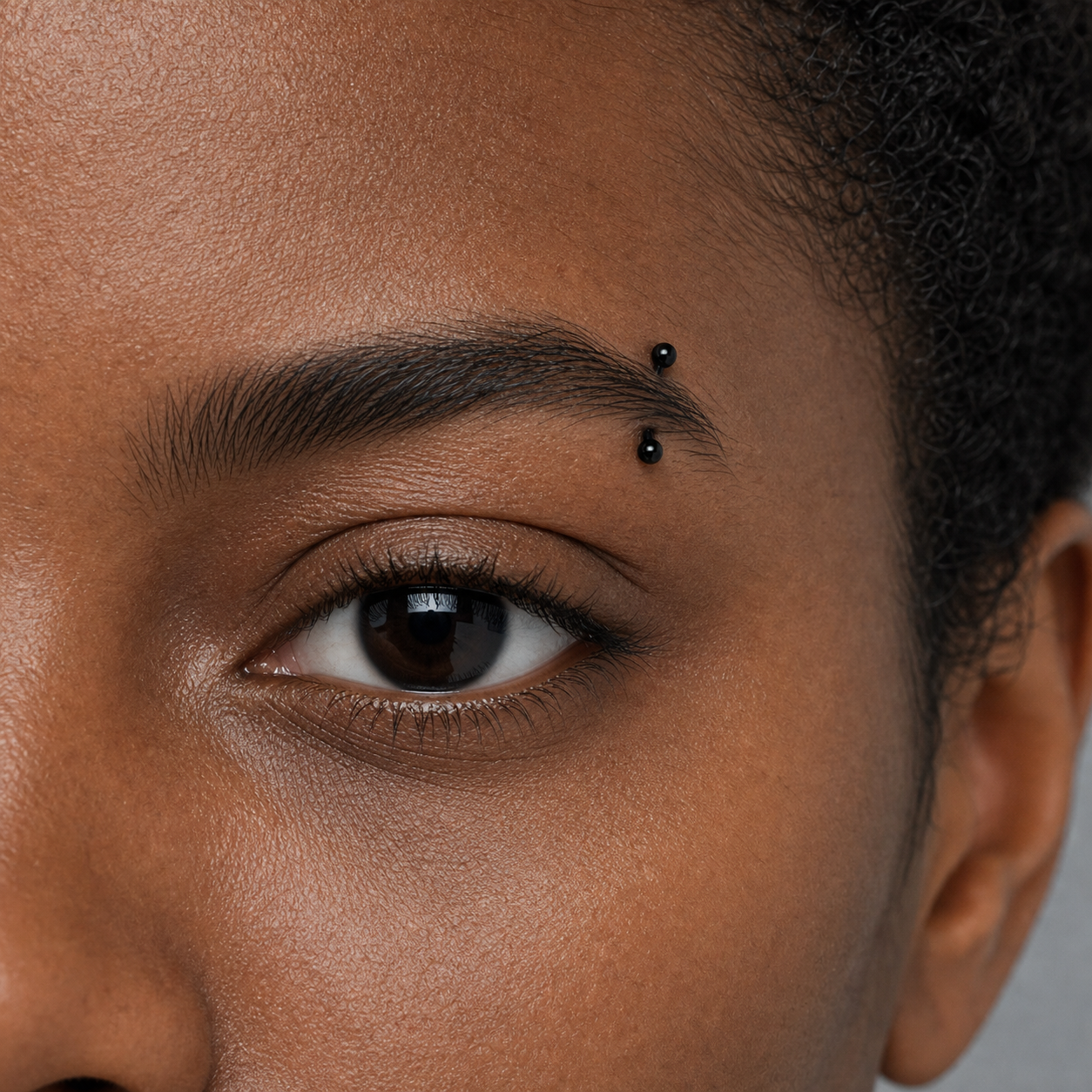 Implant Grade Titanium - Eyebrow Ring - Black - 16G (1.2 x 6+3+3 mm) - model wear view