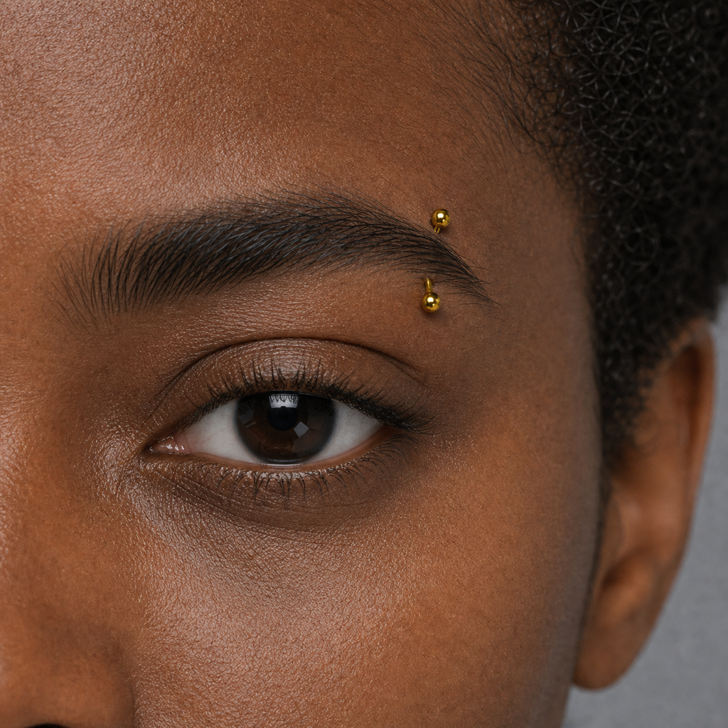 Implant Grade Titanium - Eyebrow Ring - Gold - 16G (1.2 x 8+3 x 3 mm) - model wear view