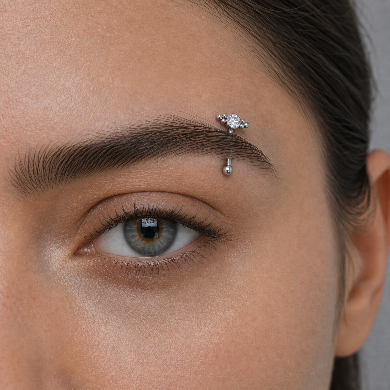 Implant Grade Titanium - Eyebrow Ring - Silver - Clear CZ - 16G (1.2 x 8 mm) - model wear view