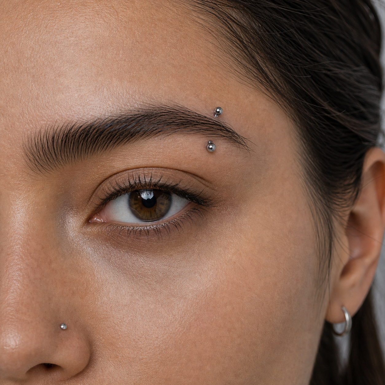 Implant Grade Titanium - Eyebrow Ring - Silver - 16G (1.2 x 8 mm) - model wear view