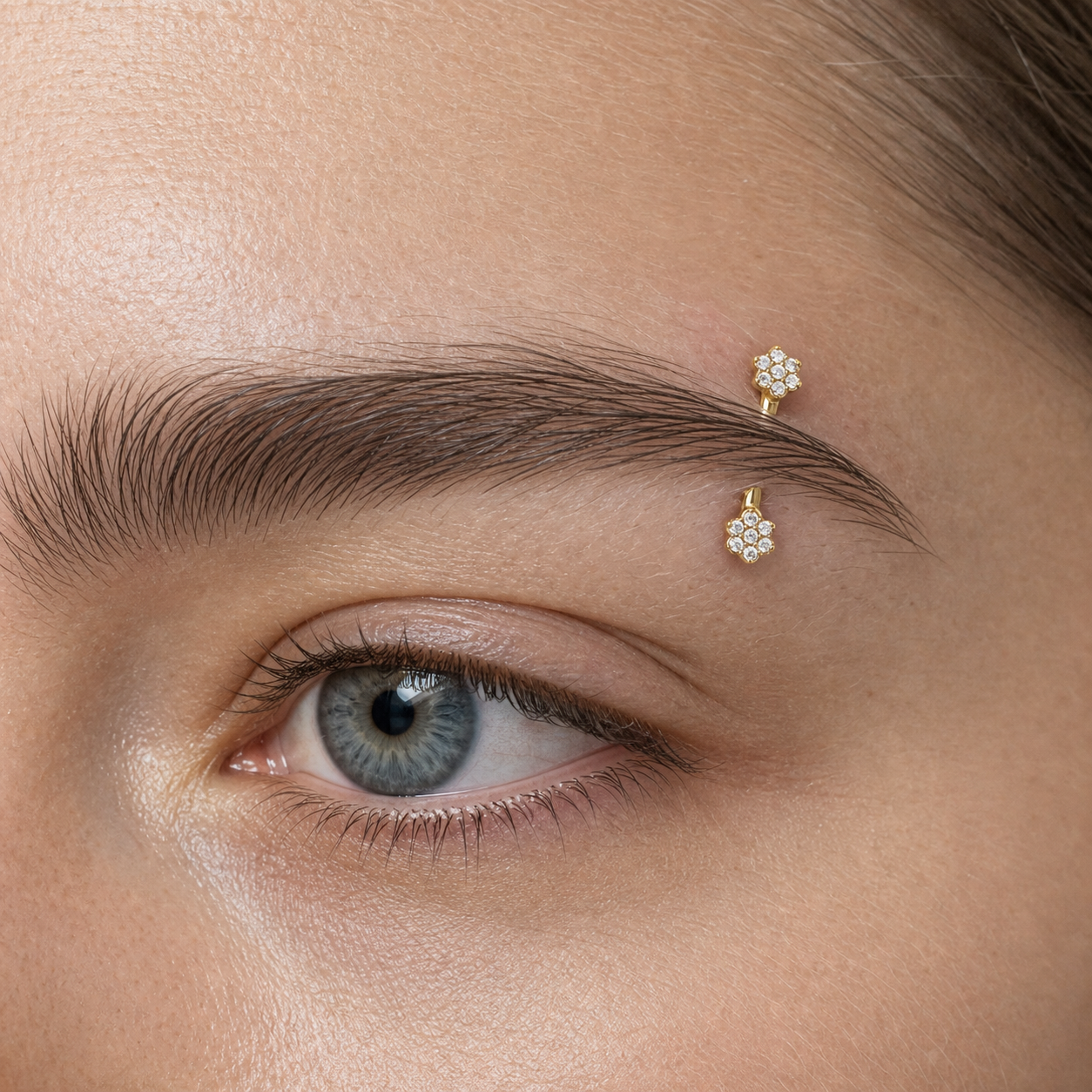 Implant Grade Titanium - Eyebrow Ring - Gold - Clear CZ - 16G (1.2 x 8+3+3 mm) - model wear view