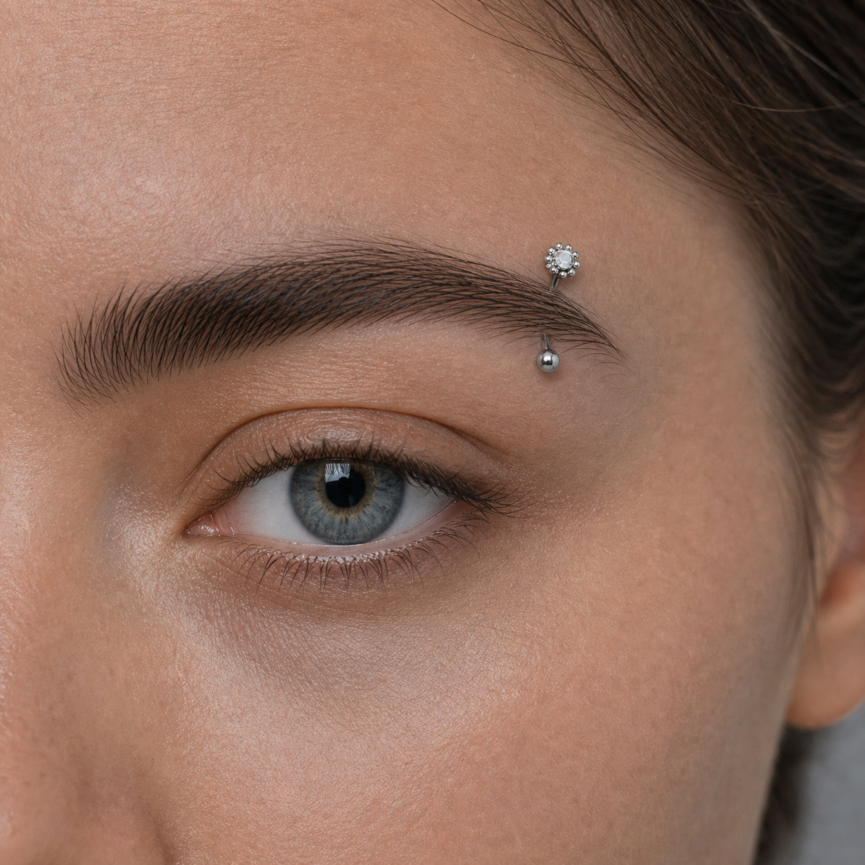 Implant Grade Titanium - Eyebrow Ring - Silver - Clear CZ - 16G (1.2 x 8 mm) - model wear view