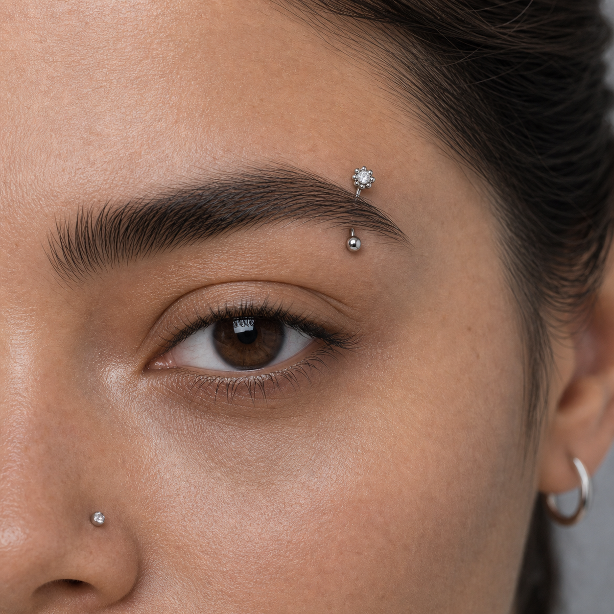 Implant Grade Titanium - Eyebrow Ring - Silver - Clear CZ - 16G (1.2 x 8 mm) - model wear view