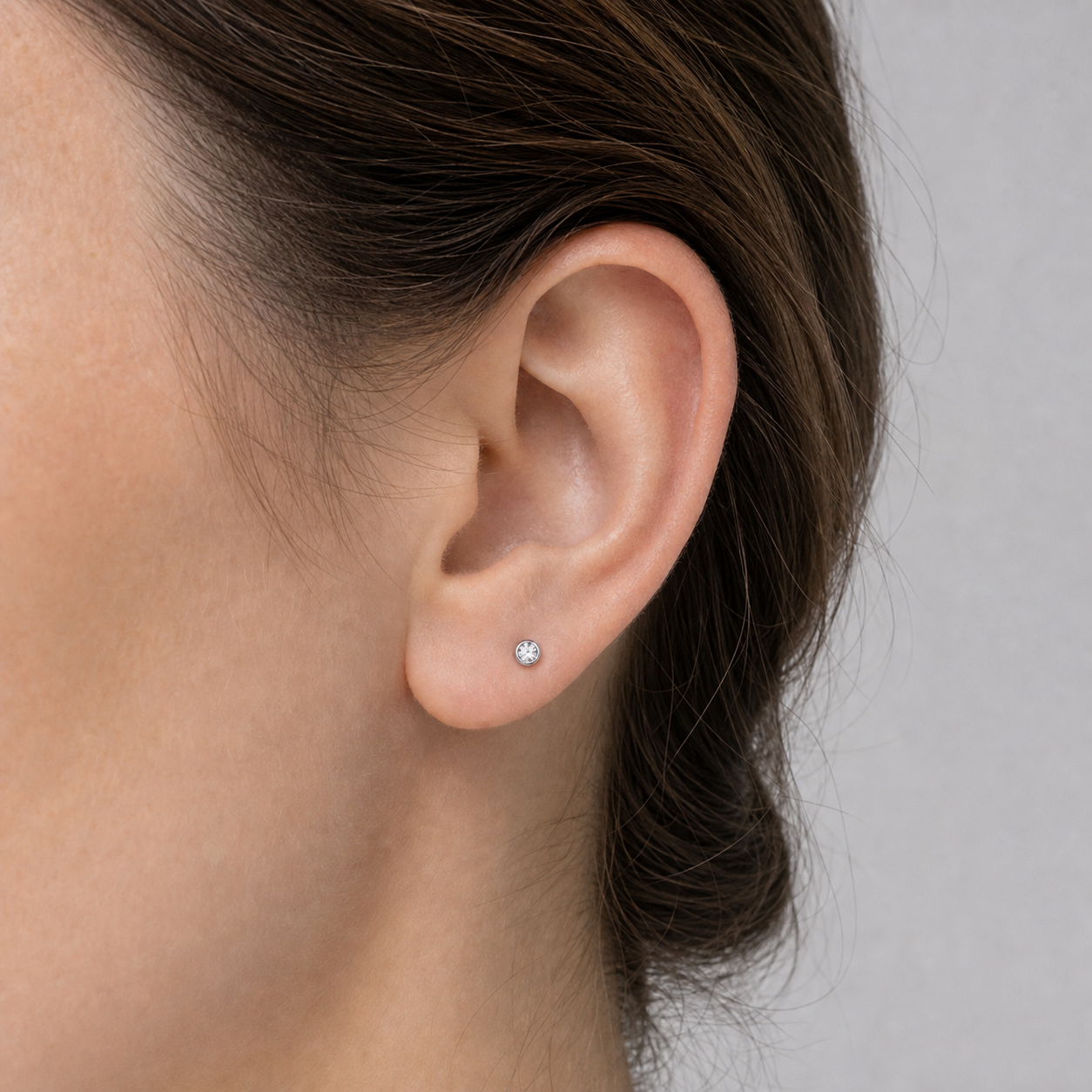 Implant Grade Titanium - Flat Back - Silver - Clear CZ - 16G (1.2 x 10+3 mm) - model wear view