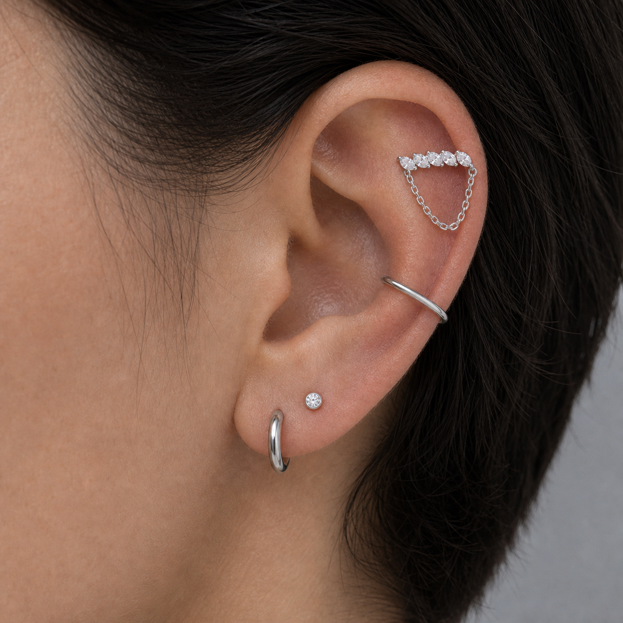 Implant Grade Titanium - Flat Back - Silver - Clear CZ - 16G (1.2 x 8+4 mm) - model wear view