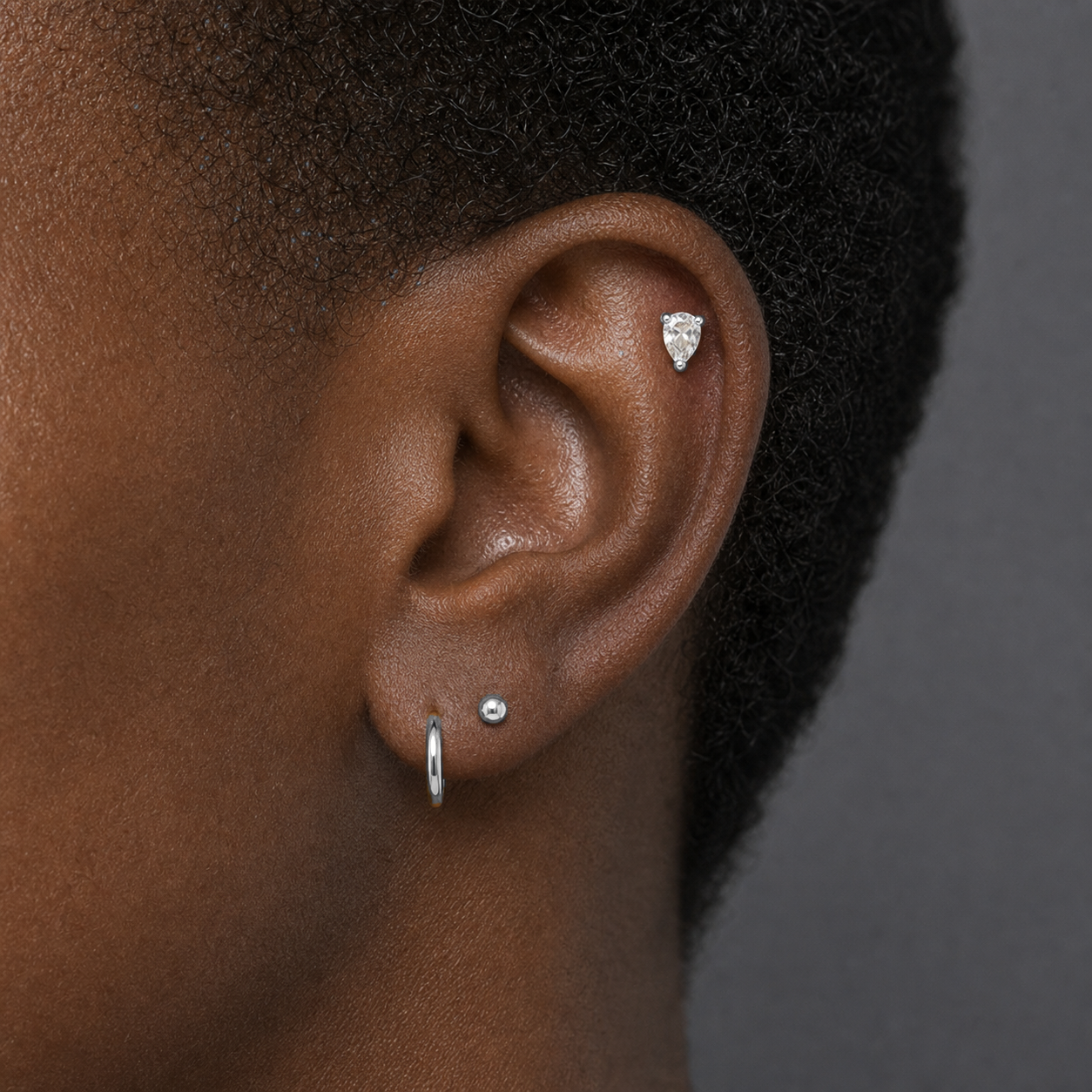 Implant Grade Titanium - Flat Back - Silver - Clear CZ - 16G (1.2 x 8+4 mm) - model wear view