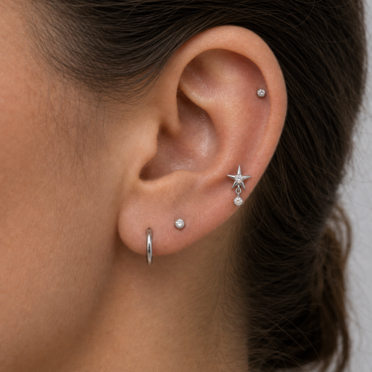 Implant Grade Titanium - Flat Back - Silver - Clear CZ - 16G (1.2 x 6+4 mm) - model wear view