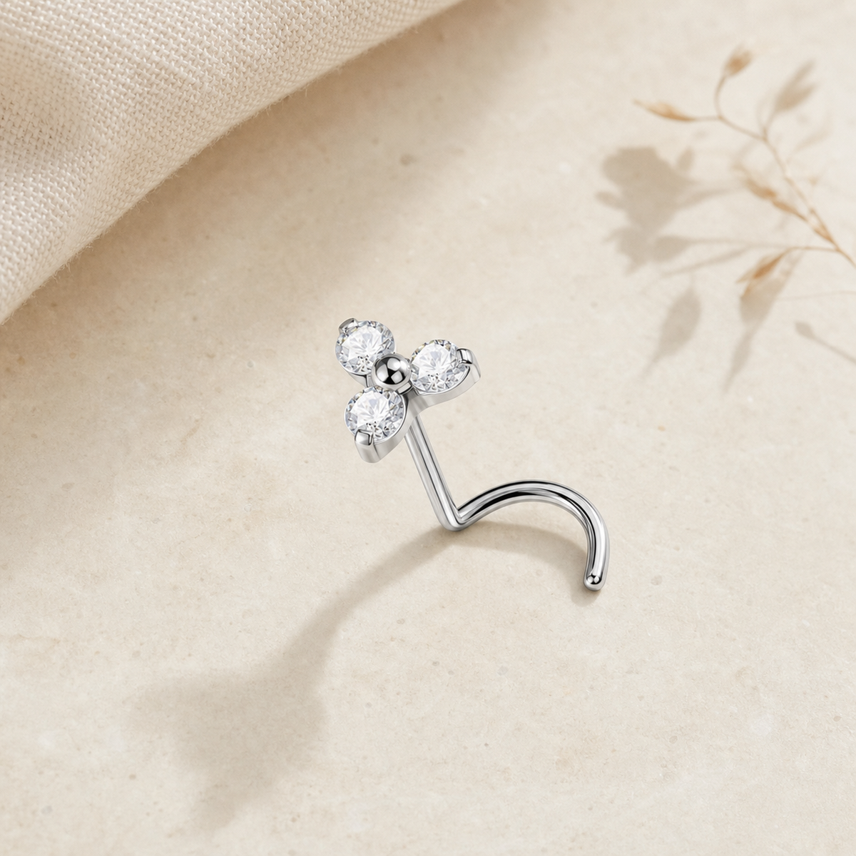 [TOPOSH-LEGACY-LAYOUT-REPAIR-20260717-LEGACY24:TP-NS-SIL-20G6-CLCZ-025:06] Trinity Clear CZ Titanium Nose Jewelry – Silver | 06_accessory_flatlay