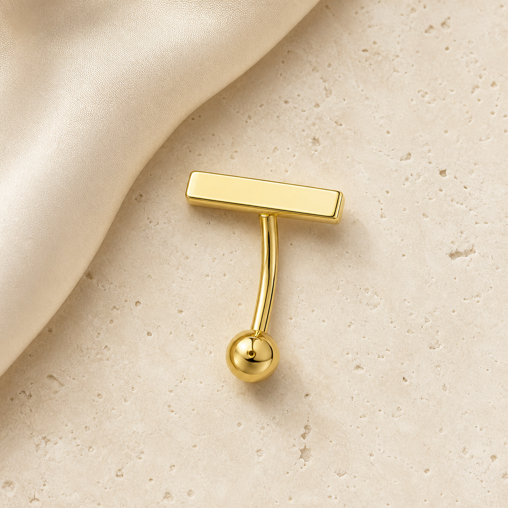 [TOPOSH-LEGACY-LAYOUT-REPAIR-20260717-LEGACY31:TP-BBR-GD-14G10-T5-PLN-007:06] T-Bar Titanium Belly Button Ring – Gold | 06_accessory_flatlay