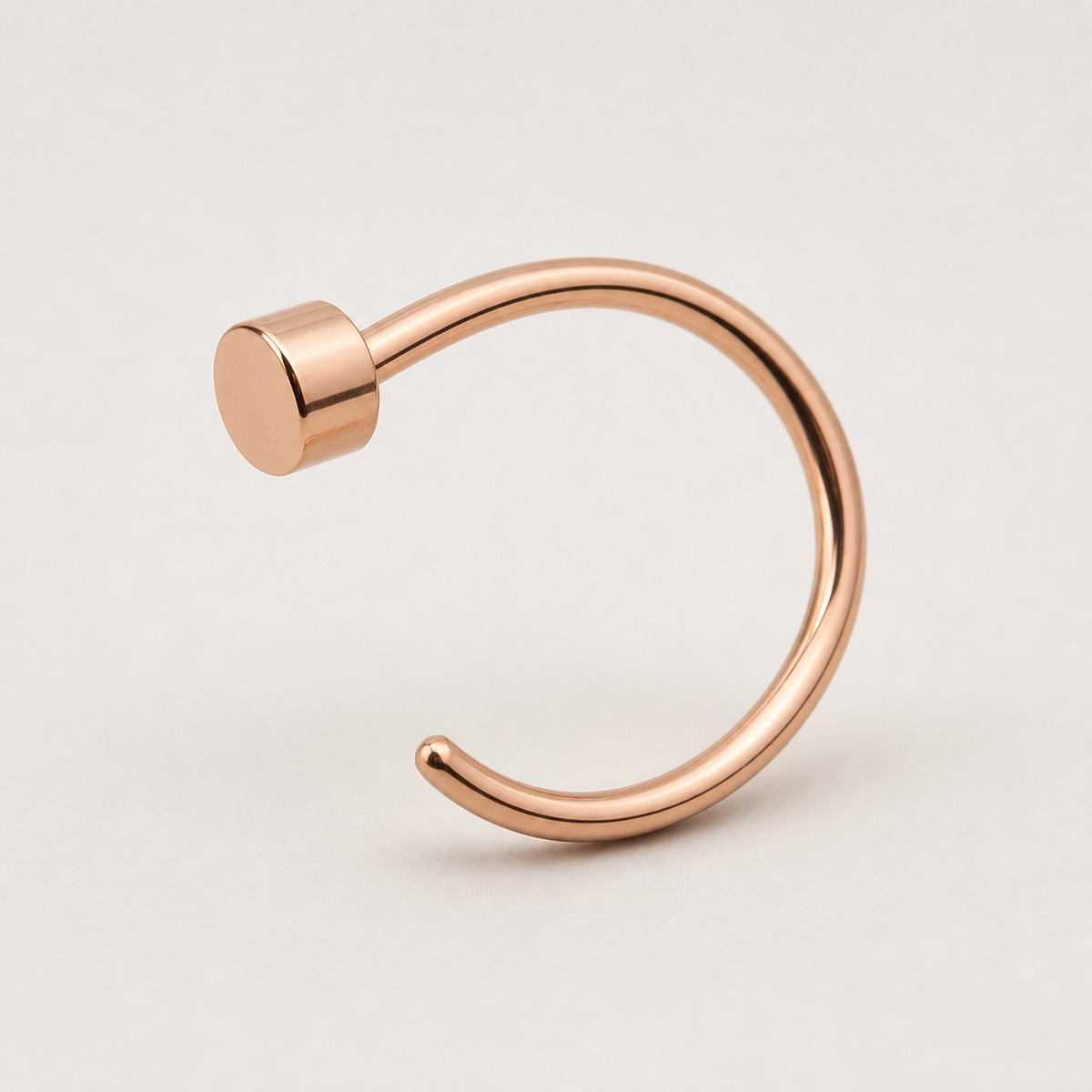 [TOPOSH-ROLE-ORDER-CLEANUP-20260717-BATCH11:TP-NS-RG-18G8-PLN-008:05] Titanium Nose Hoop – Rose Gold | 05_product_angles